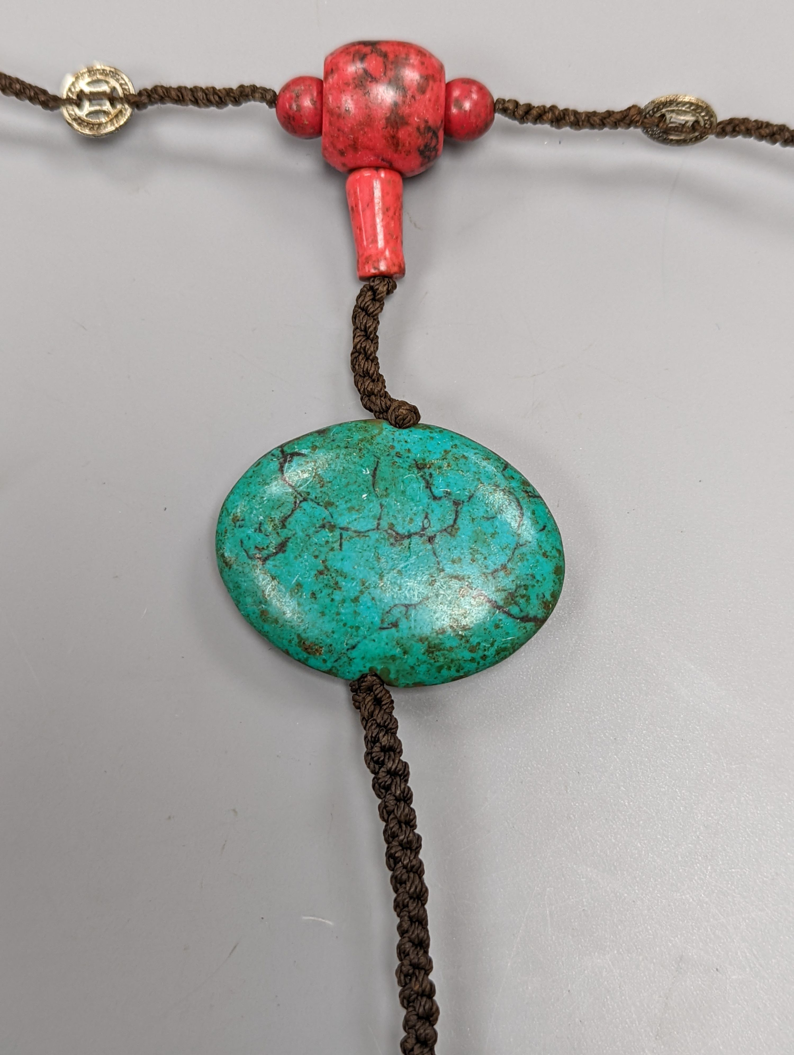 A Chinese turquoise matrix court style necklace in a hardwood box